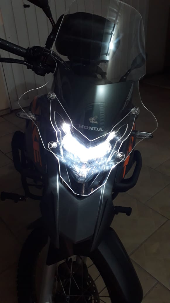 PROTETOR DE FAROL HONDA XRE 300 19/23